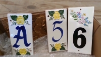 Gold leaf plaque and 3 door plaques - 3