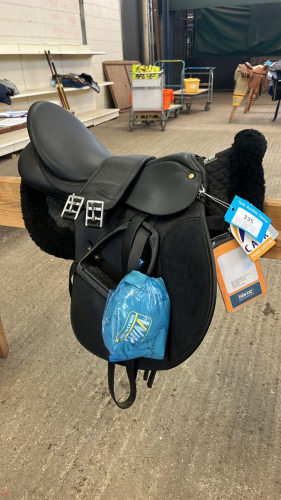 Wintec Cair custom fit saddle complete with gullet system, girth and stirrups - excellent condition.