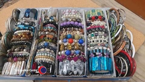 Large tray of bangles and bracelets