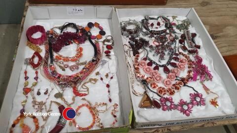 2 x trays of mainly red and pink fashion jewellery