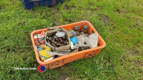 Box of old stock unused car spares including fuel and water pumps