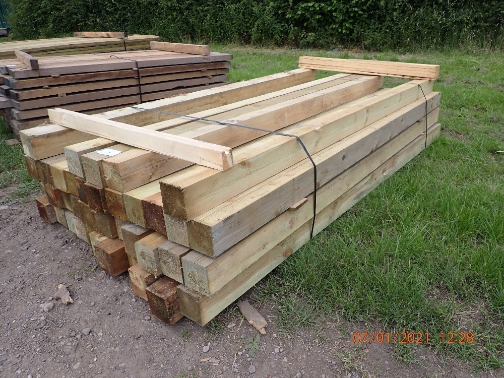 Pack of timber boards, spars, hardwood, joists, kerruing, trailer