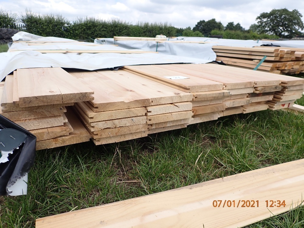 Pack of timber boards, spars, hardwood, joists, kerruing, trailer