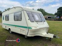 Caravan, dry, tows well, every thing works, shower toilet etc, built in septic tank, keys, ready to hook up and get gone, key in office