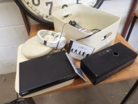 Cream faux leather lidded storage box containing CDs, Sony DVD/CD player and remote, 2 Bluetooth speakers, headphones