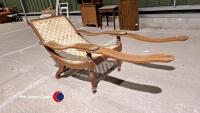 Original vintage Indian veranda chair, teak with rattan seat. Bought in Delhi and imported back to the UK in the 90's. In good condition though in need of a little maintenance on one of the arms. - 5