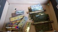 Bundle of brass door hinges