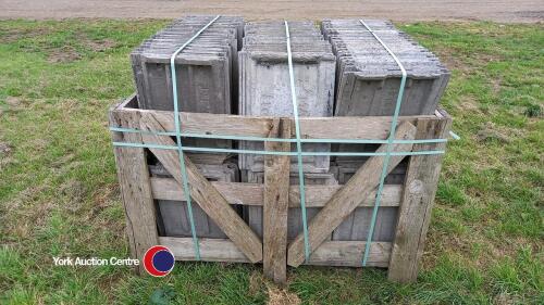 Crate of grey roof tiles