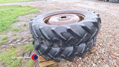 Pair 13.6/12 R 36 Dunlop tyres on Nuffield / Leyland rims