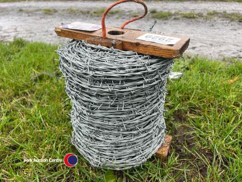 Roll of new barbed wire