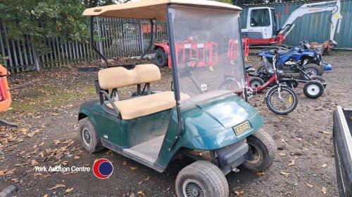 Ezgo battery golf buggy, key and charger in office