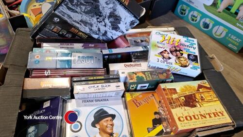 Box of CD & DVD box sets.