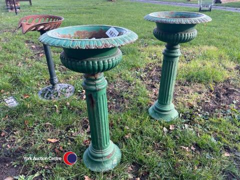 Pair of cast iron urns