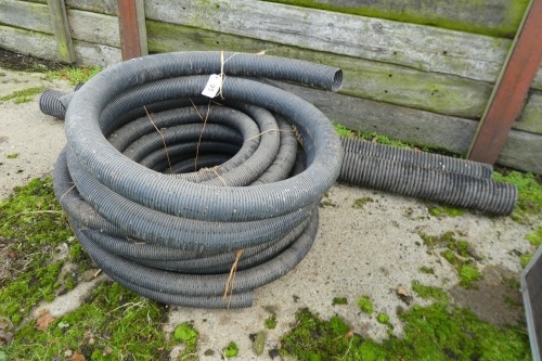 Roll of drainage pipe and 2 solid pipes