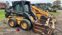 New Holland skidsteer c/w bale spike and muck scraper - Key in office
