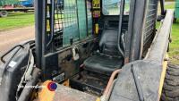 New Holland skidsteer c/w bale spike and muck scraper - Key in office - 5