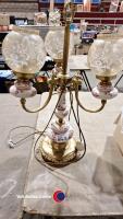 Large glass and other smaller chandeliers