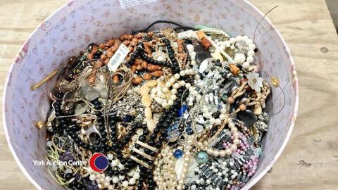 Large round decorative box of costume jewellery including spares and repairs