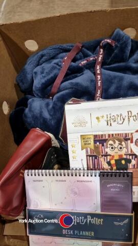 Various Harry Potter items including onesie, purse, bag and stationery