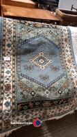 Blue, cream and green floral border rug