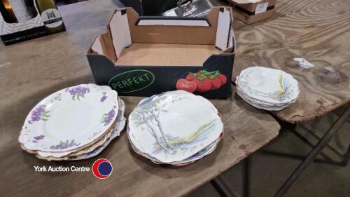 Assorted china plates