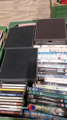 Box of DVDs including films, comedy, Harry Potter box set