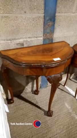 Walnut top veneered mahogany folding card table with claw and ball feet