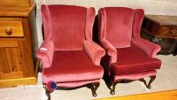 Pair of fuchsia upholstered high back arm chairs