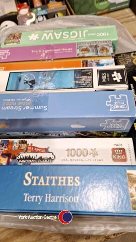 Box of nearly new jigsaws