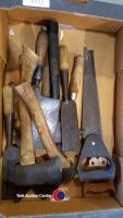 Tray of axes, sickles and cutting tools