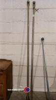 Pair of large brass curtain poles