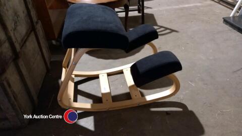 Ergonomic kneeling chair, a rocking chair for back support, black upholstery