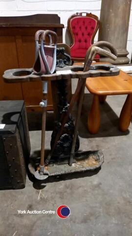 Vintage cast iron walking stick & umbrella stand, with walking sticks