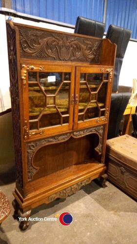 Old display cabinet with brass hinges