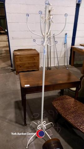 White hat and coat stand