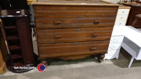 Dark wood chest of drawers