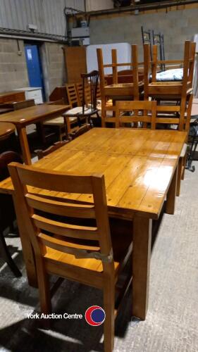 Distressed wooden extending dining table and 6 chairs