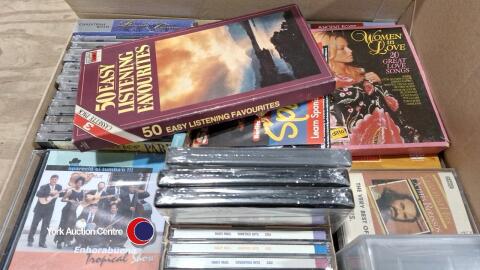 Box of CDs, videos and cassettes