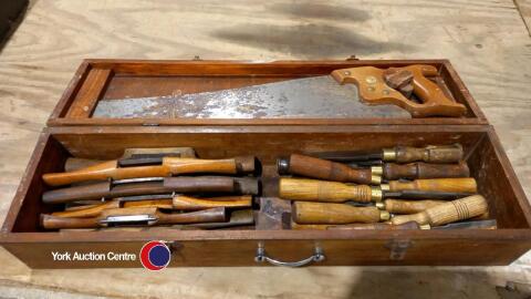 Box of vintage wood working chisels and spoke shaves