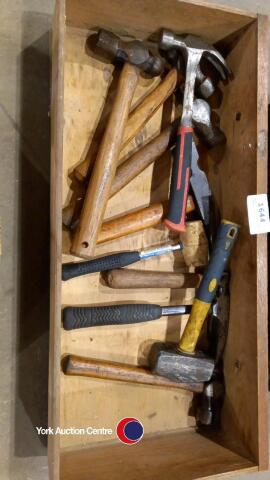 Box of different size hammers