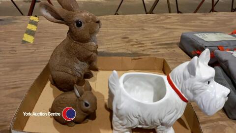 Two rabbits and dog planter