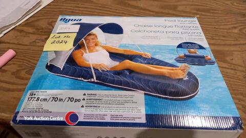 Brand new never used Aqua pool lounger with canopy. Perfect for holidays and pool parties