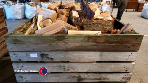 Large crate of hardwood logs