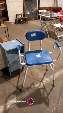 Blue and white perching stool and a blue bedside cabinet