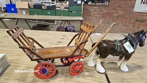 Shire horse and wooden cart