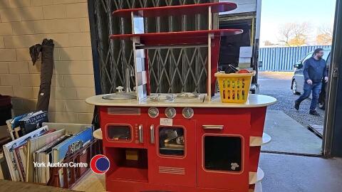 Child's play kitchen with lots of accessories