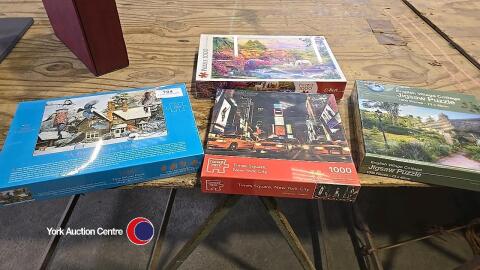 4 x new sealed jigsaws