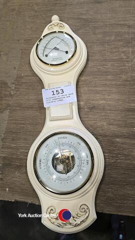 Barometer in white wood with temperature and humidity index.