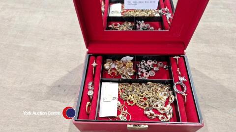 Red jewellery box with contents