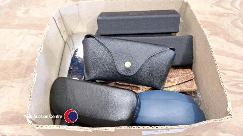 Assortment of eye glasses and sun glasses with cases